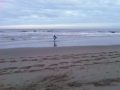 Surfer at Moggs Eye Beach, Lincolnshire